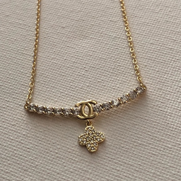 None Jewelry - Gold-Tone Crystal Bar Necklace with Four-Leaf Clover Charm